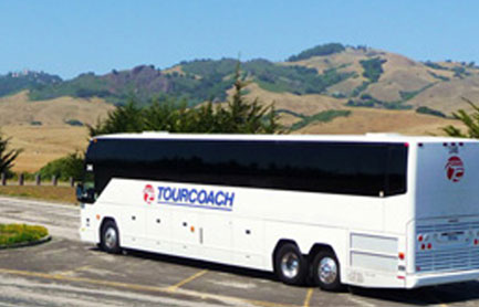 Parked white TourCoach Bus